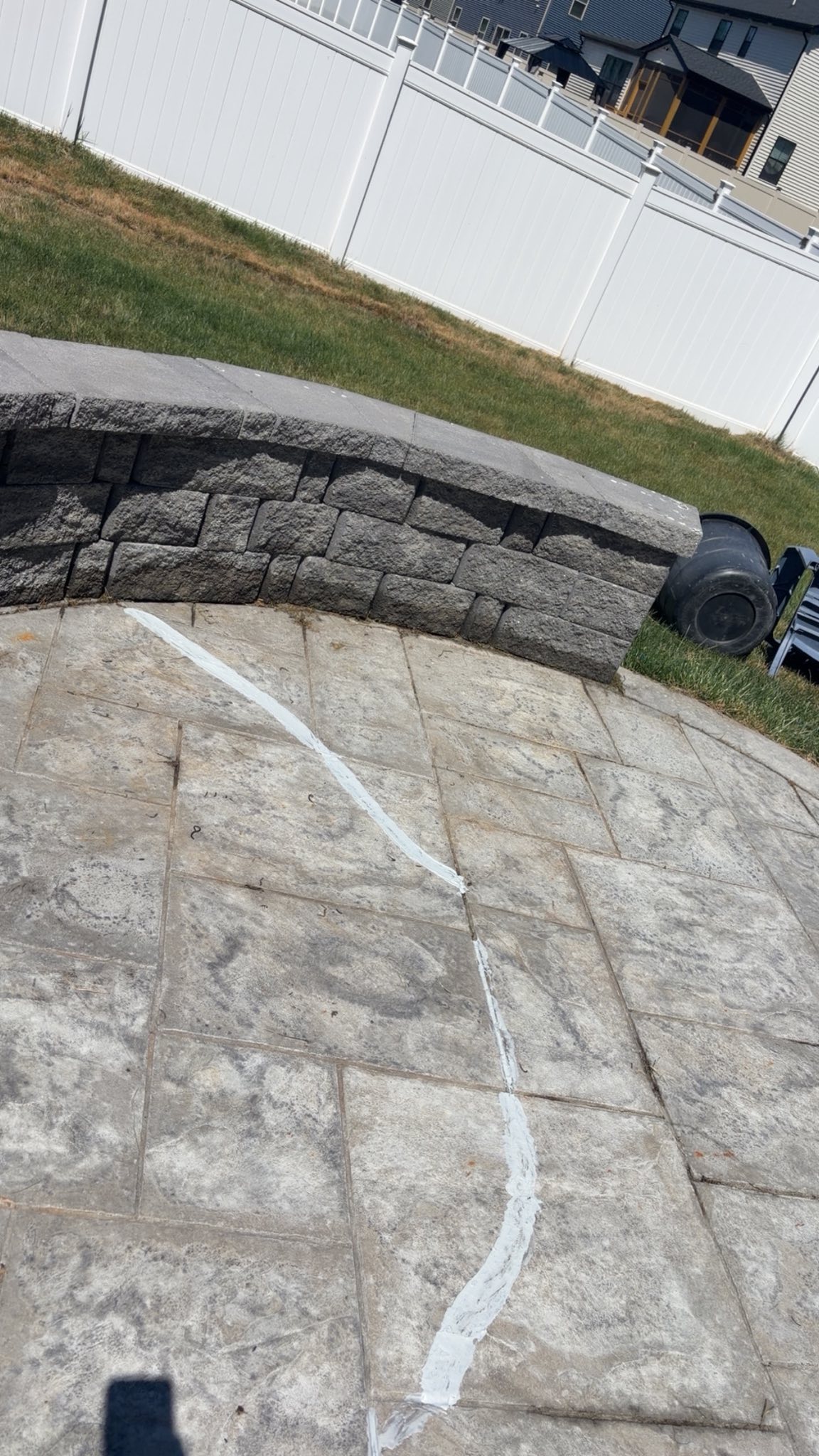 Stamped concrete patio with crack repair applied